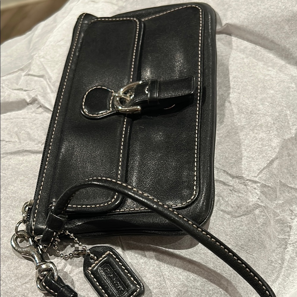 Coach Black Clutch with Leather Material and Wrist Strap